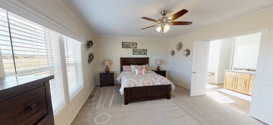 The K3066A Primary Bedroom. This Manufactured Mobile Home features 3 bedrooms and 2 baths.