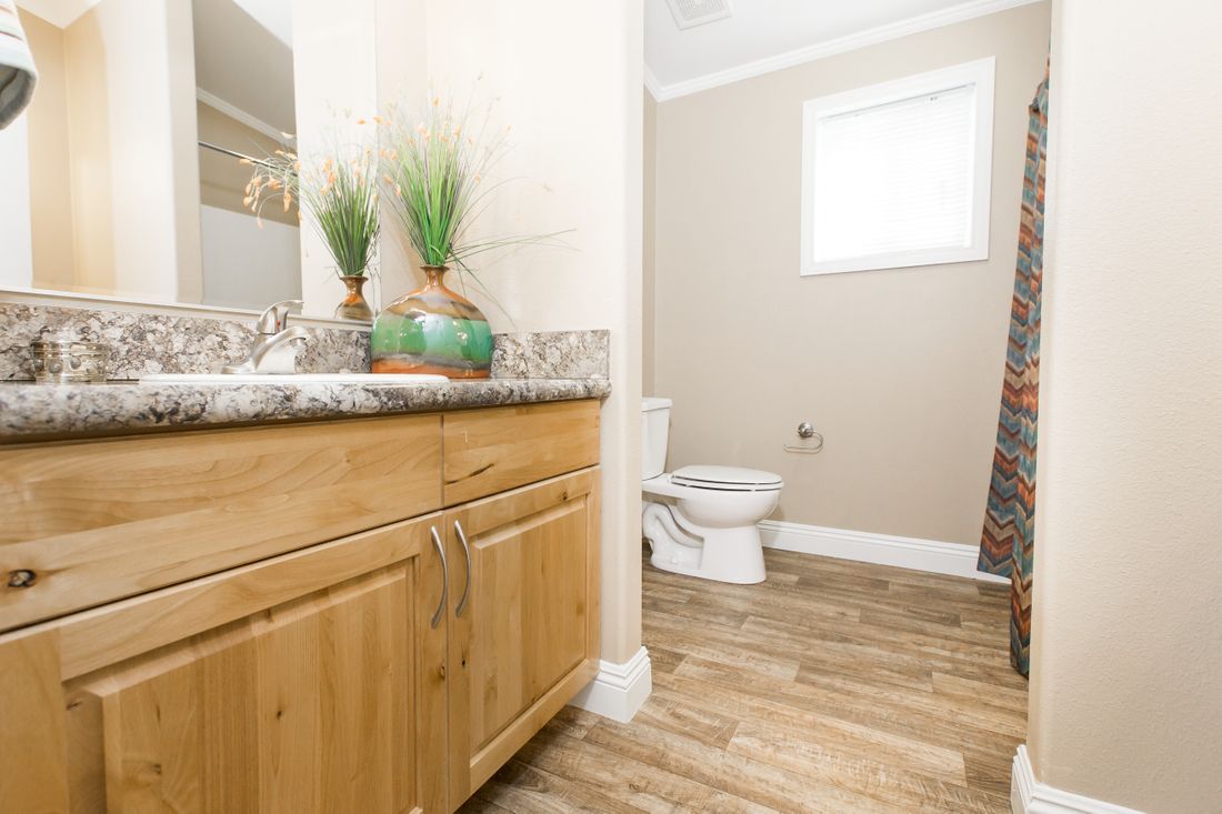 The K2776A Guest Bathroom. This Manufactured Mobile Home features 4 bedrooms and 2 baths.