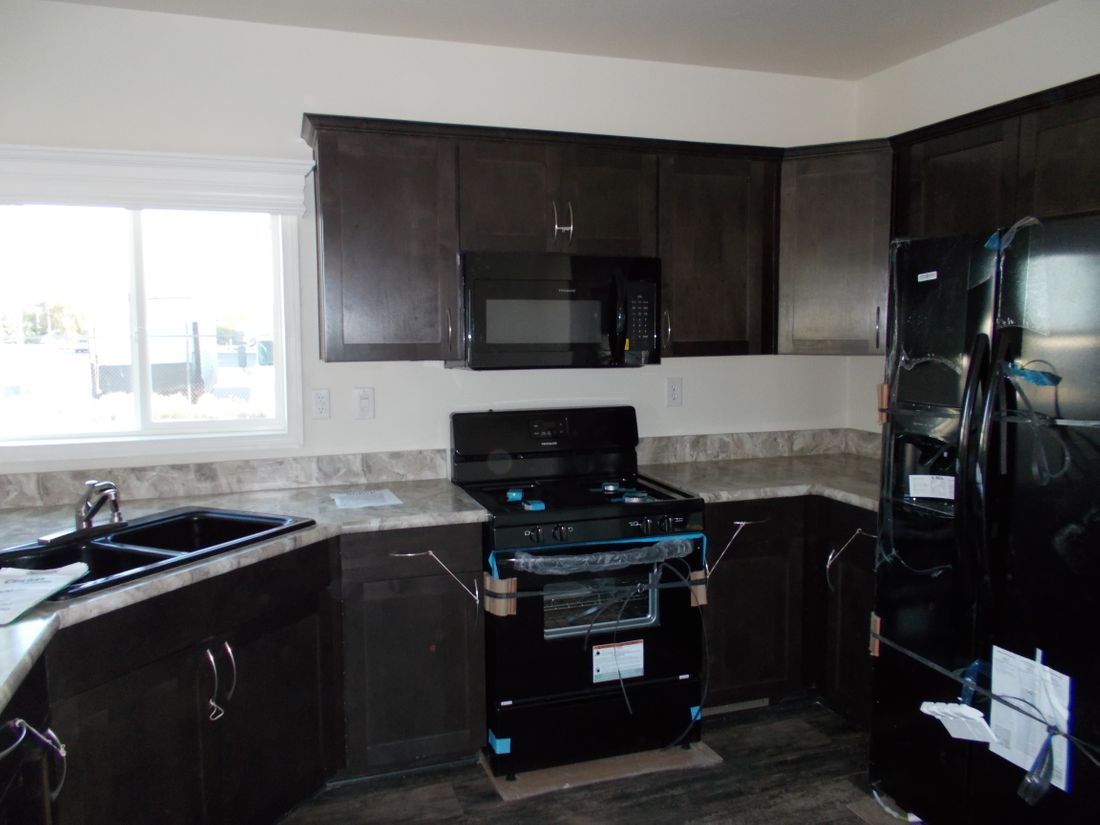 The K1656A Kitchen. This Manufactured Mobile Home features 2 bedrooms and 1 bath.