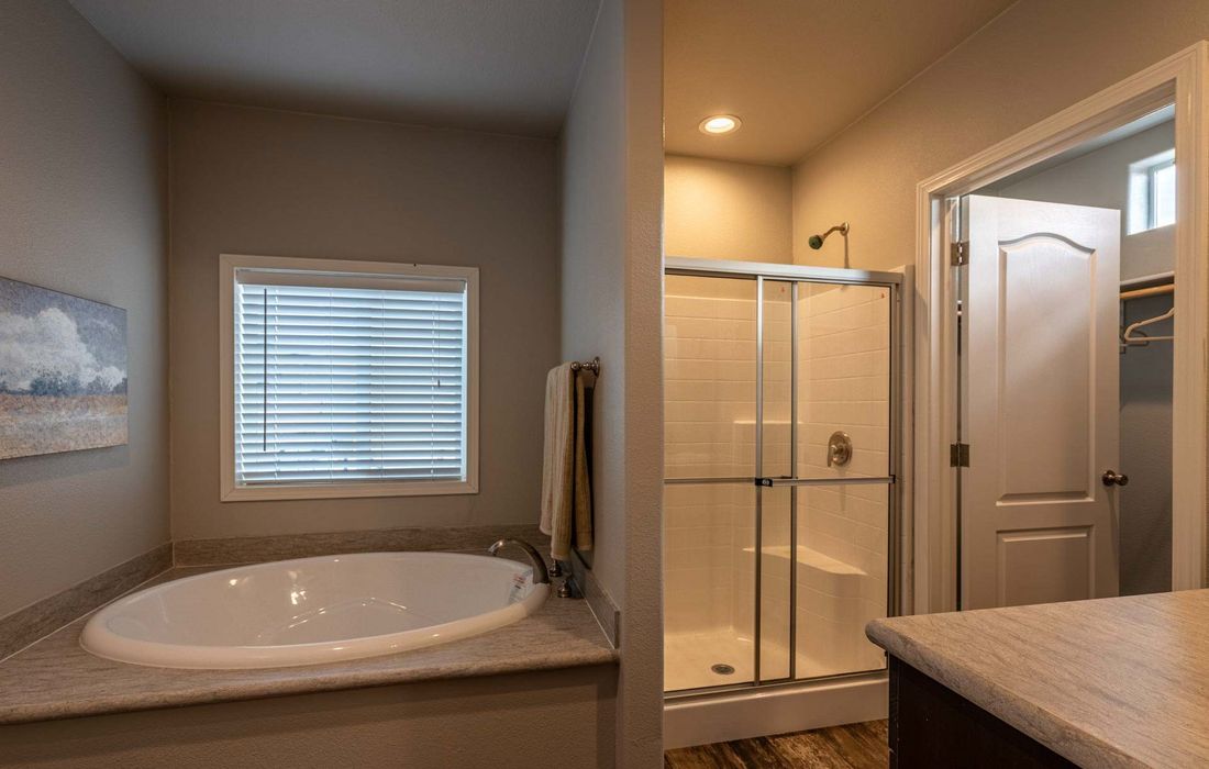 The K1676H Master Bathroom. This Manufactured Mobile Home features 3 bedrooms and 2 baths.