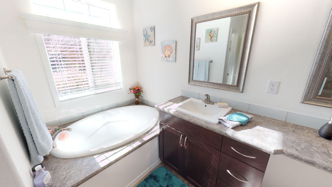 The SUM3068A Master Bathroom. This Manufactured Mobile Home features 3 bedrooms and 2 baths.