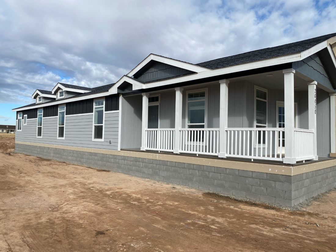 The SUM3076A Exterior. This Manufactured Mobile Home features 4 bedrooms and 2.5 baths.
