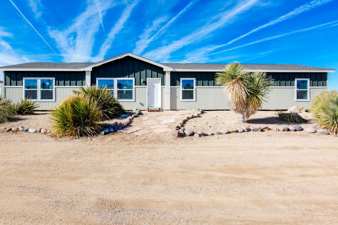 The THE WAVE Exterior. This Manufactured Mobile Home features 4 bedrooms and 2 baths.