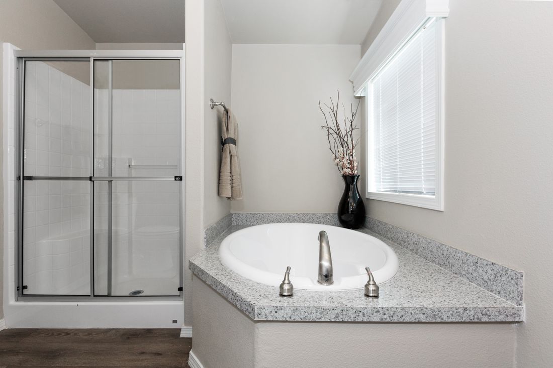 The K2744A Primary Bathroom. This Manufactured Mobile Home features 3 bedrooms and 2 baths.
