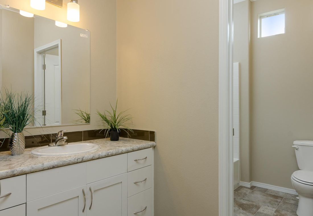The TRANQUILITY TR3062A Master Bathroom. This Manufactured Mobile Home features 3 bedrooms and 2 baths.