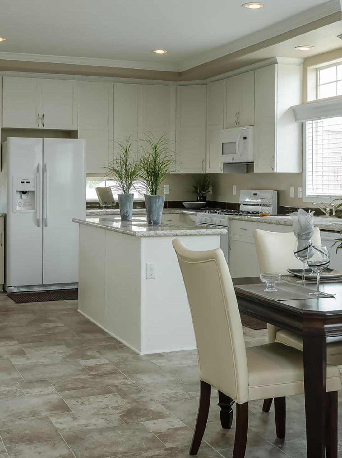 The TRANQUILITY TR3062A Kitchen. This Manufactured Mobile Home features 3 bedrooms and 2 baths.