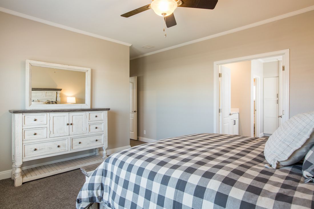 The EDGEWOOD Master Bedroom. This Manufactured Mobile Home features 3 bedrooms and 2 baths.