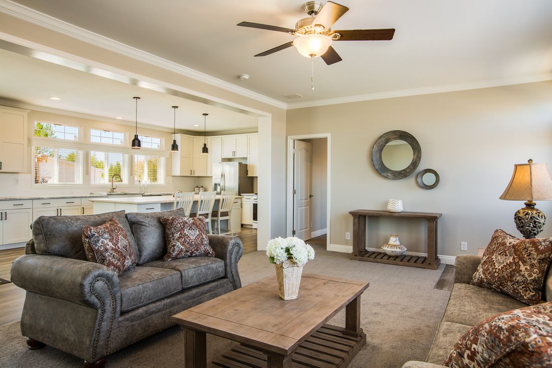 The EDGEWOOD Living Room. This Manufactured Mobile Home features 3 bedrooms and 2 baths.