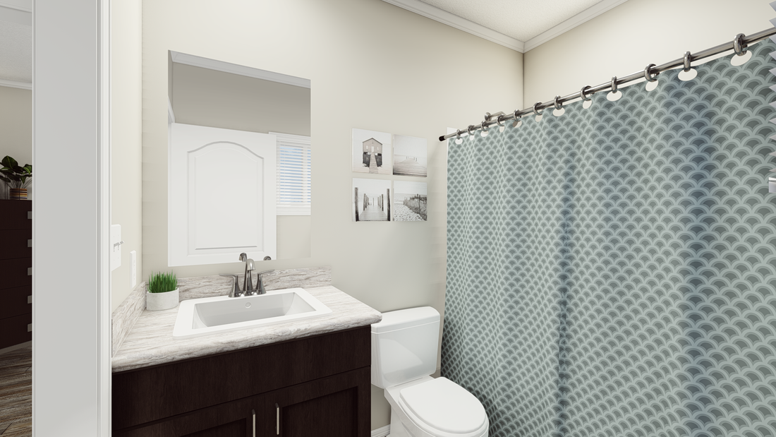 The K1668A Guest Bathroom. This Manufactured Mobile Home features 2 bedrooms and 2 baths.